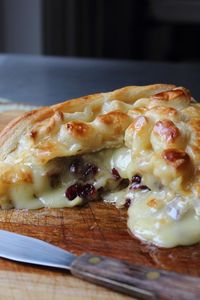 Baked Stuffed Brie with Cranberries & Walnuts