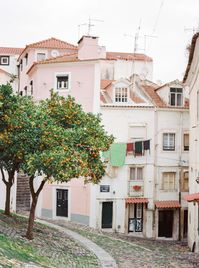 One of the most beautiful places in Europe - Portugal and it's capital Lisbon. Charming little streets, scents of orange blossom, sailing boats, azulejos. Must see and inspire for more travel ideas. What to do in Lisbon? | Yana Schicht | Signature print from analog film photography