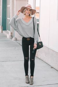 thermal top, black jeans, hat, ankle booties