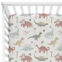 FINAL SALE Raaawwrrr! Design your nursery around Prehistoric Pals Crib sheets in modern colors. All boy, and on trend! This super soft crib sheet is the perfect way to add a little style to your dinosaur nursery. Crib Sheet Details: 100% Super Soft Jersey Knit Poly Fits standard size crib mattresses 28"x52" Elastic around all edges Care Instructions: Machine Wash - Gentle Cycle Tumble Dry Low Warm Iron as Needed