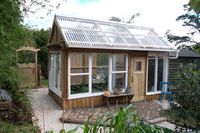 A greenhouse made from recycled windows!