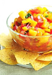 Peach Salsa made with ripe, intoxicating fresh peaches - enjoy this with sprouted-grain pitas, on top of chicken or fish, or just by the bowlful! Sub xylitol (or 5-7 drops of stevia) for the sugar.