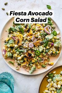 35min · 6 servings  Fiesta Avocado Corn Salad with fresh herbs, jalapeño, toasted pumpkin seeds, and creamy dressing. A slam-dunk summer side dish, this 30 minute avocado and corn salad will be the star of any cookout or potluck.  5 ears of corn, husked  ▢4 Tbsp. extra-virgin olive oil  ▢3 Tbsp. rice vinegar  ▢2 Tbsp. mayonnaise  ▢1 grated garlic clove  ▢¾ tsp. ground sumac (sub paprika)  ▢¾ tsp. kosher salt  ▢½ tsp. black pepper  ▢1 small shallot  ▢2 medium (or 3 small) ripe avocados  ▢1 jalapeño  ▢¼ cup fresh basil leaves  ▢3 Tbsp. fresh mint leaves  ▢¼ cup roasted, salted pumpkin seeds  ▢3 to 4 Tbsp. crumbled Cotija cheese