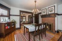 A fireplace in a dining area gives the room warmth. Click the link for more details on 163 Claremont Ave, located in the NYC suburb of Montclair, New Jersey. #montclair #montclairrealestate #njrealestate #njrealtor #colonial #Nycsuburb #commuter #njhomes #glenridge #Bloomfield #fireplace #woodmantle #hardwoodfloor #diningroom #darkwood