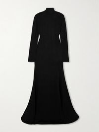 TOM FORD's maxi dress was styled with a sculptural belt as part of the second look at the label's Spring '24 show, which marks Peter Hawkings' debut as Creative Director. Designed with a chic turtleneck, it's finely knitted for a semi-sheer finish and fits slim before flaring out to a floor-sweeping hem.