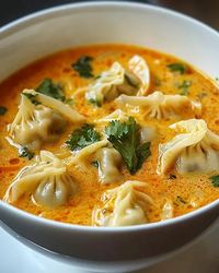 This post may contain affiliate links learn more     This Thai Red Curry Dumpling Soup combines bold, aromatic flavors with a creamy coconut broth, crisp vegetables, and tender dumplings. The ... Read more