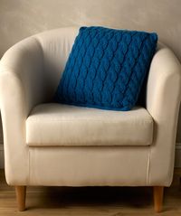 Statement Cable Pillow Free Knitting Pattern from Red Heart Yarns