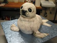 Ok, cutting into this baby seal cake would be just so wrong!  (I hope they didn't use red velvet!)