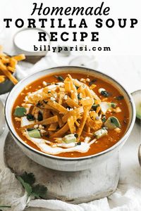 Learn how easy it is to make this authentic Mexican homemade tortilla soup that is topped off with avocados, fried tortilla strips, and cilantro.