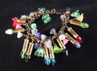 This charm bracelet or bullet bracelet is "loaded" with bling and "flower power".  Use coupon code DESIGNSBLOOM and get 10% off.