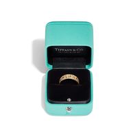 Tiffany T is an expression of love’s endless potential. Inspired by an archival bracelet from 1975, T is an homage to the House’s iconic motif and the spirit of New York, which founder Charles Lewis Tiffany regarded as the place of promise and possibilities. The bold, alternating links of this ring feature the letter T traced in striking pavé diamonds. 18k gold with round brilliant diamonds; 5.5 mm wide; Carat total weight .99 | Tiffany T True Wide Ring in Gold with Pavé Diamonds, Size: 7