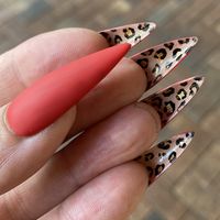 Create this look using the Wildflowers Stiletto Nails in a Box.  You can stamp on the cheetah using the Wildflowers Jungle Plate, or hand paint the look using the Artist's Gel Paints, or "Void" gel polish.  Build in reverse layers, and then finish with Wildflowers Matte Topcoat.