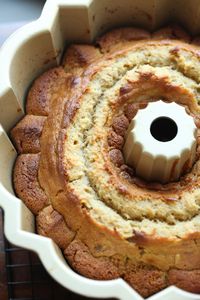 This fluffy banana pound cake is made with ripe bananas and crunchy chopped walnuts! Top it with an easy homemade vanilla glaze and enjoy!