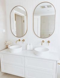 Bathroom design | minimalist bathroom | modern bathroom | clean bathroom inspo | simple bathroom | interior design | home design | bathroom vanity | bathroom mirror | luxury bathroom | white bathroom | bright bathroom | double vanity | oval mirrors  #bathroomdesign #homeinteriordesign #modernbathroom