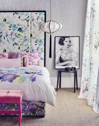 An oversized upholstered headboard can create a breathtaking centre piece for a bedroom. This floral pattern here is bang on trend and and creates a lovely feminine room.