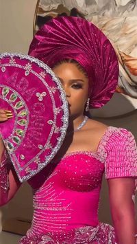 Fuchsia pink Igbo traditional wedding outfit for Nigerian Brides