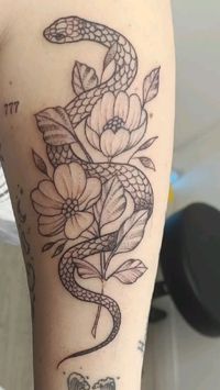 #snaketattoo #snakeflowertattoo #art #snake #minimalisttattoo #flowers #tattoo #forearmtattoos