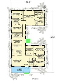 This wonderful Florida home plan comes with a U-shaped floor plan that creates a side courtyard. Six bedrooms are split up into two corners of the home. Everything is efficiently laid out with the main living area between the two bedroom wings. A pass-through in the kitchen lets you see into the living room so you can cook and still be part of the activity. The large dining room is open to the kitchen for ease in serving.