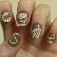 Many artists look to the past for inspiration, but for manicure masterpieces, some polish Picassos are looking way back: to the prehistoric era, and to