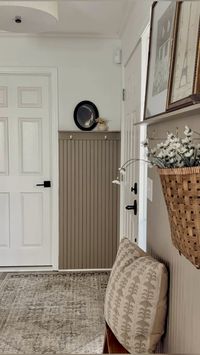 Neutral entryway, neutral decor, entryway rug, entryway design, budget friendly entryway, bead board design, bead board entryway, entryway bench, wooden bench, photo ledge, wall art, black oval frame, entryway decor, foyer decor