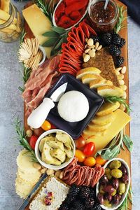 how to build a beautiful, yet simple, Italian Charcuterie board for effortless entertaining.  This Italian Charcuterie board is not only a cinch to throw together, but it makes a gorgeous presentation for serving guests.