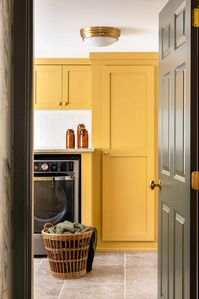 yellow contemporary laundry room