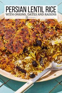 Adas polo is a Persian rice and lentils recipe with saffron, cinnamon, raisins, dates and a crispy tahdig layer. A show-stopping special occasion side dish!