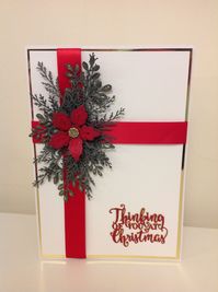 This card has been created using :- Sue Wilson - Evergreen Branches Die Sue Wilson - Triple Layer Poinsettia Die Sue Wilson - Thinking Of You At Christmas Die Sue Wilson - Winter Foliage Die Creative Expressions - Falling Snow Embossing Folder