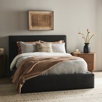 Modern, clean shaping meets inflated comfort with this padded, upholstered bed frame in a textural boucle-like pattern. Features Easton Collection Available in two sizes Available in Lisbon Charcoal or Lisbon Cream fabric color with Black frame finish Four Hands Quincy Bed in Black, Size Queen