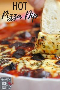 The best hot pizza dip, originally from a Pampered Chef recipe - Simple and easy with cream cheese and pizza sauce, this dip is the perfect appetizer. Low carb and gluten free. Great with pepperoni, olives, mushrooms, or other pizza toppings. Perfect food for the Super Bowl or parties. Kids love this too. Lots of mozzarella cheese.