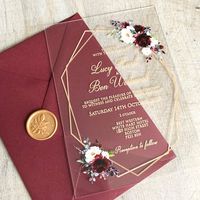 WOW your guests with these stunning burgundy & ivory acrylic wedding invitations. They feature a geometric frame and floral bouquets.  FULLY PERSONALISED TRANSLUCENT ACRYLIC INVITATION INCLUDES THE FOLLOWING: INVITATION UV printed on a beautifully clear 1mm or 2mm acrylic or 0.5mm PVC (please make your choice from the drop-down menu) Text is fully customisable - Change as little or as much as you like! Dimensions: 127 x 178 mm / 5 x 7 inch INVITE ENVELOPE Invites are supplied with 120/130gsm env