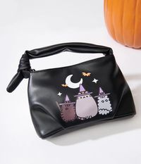 This handbag, in collaboration with Pusheen, is no trick, all treat! Crafted in a black faux leather boasting an adorable Halloween print of a witch Pusheen and friends. Outfitted with a knot top handle and magnetic snap top. Complete with a zipper closure, inner zip pocket, and removable adjustable strap.