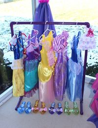 Create a disney princess dressing room at your child's birthday party so all her royal guests can play dress up. Perfect activity idea for princess themed birthday party.