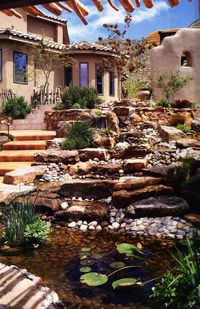 Rock steps, water ponds abound from our walkway.