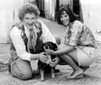 Colin Baker and Nicola Bryant and a puppy