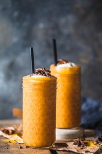 This beautiful golden Turmeric Persimmon Smoothie is your ultimate Fall smoothie! Vegan, Easy & Delicious! #vegan #smoothie #turmeric #turmericsmoothie #veganrecipe #vegetarian #vegetarianrecipes #persimmon