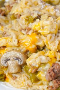 Instant Pot Philly Cheese Steak Ground Beef and Rice is an easy ground beef dinner recipe loaded with long grain white rice, green peppers, onions, mushrooms and shredded cheese.