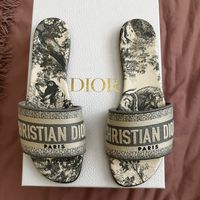 Size 37.5 (7 1/2) Dior Sandals For Sale. Grey Type Color. Gently Used. Only Worn 3 Times. Besides The Bottom Of The Shoes The Shoes Look Brand New. No Stains,M Or Rips. Purchase July 28th, 2023 ( Only One Month Old) From The Christina Dior Store On Rodeo Drive. Comes With Box