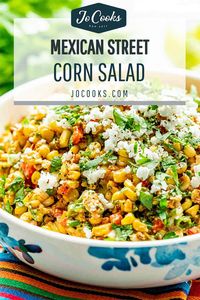 This Mexican Street Corn Salad, also known as Esquites, is smoky, spicy, tangy and incredibly delicious. If you love the Mexican corn on the cob then you will love this version. #mexicanstreecorn #salad #esquites #recipe