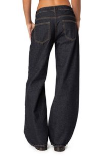 Low-slung jeans are crafted with puddling hems from nonstretch denim and turned to a classic dark-blue wash. Zip fly with button closure Five-pocket style 100% cotton Machine wash, dry flat Imported