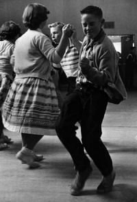 A Young Boy Stealing The Show On The Dance Floor