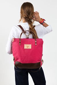 Shop our Pink Wax Canvas Backpack, perfect for the multi-tasking woman on the go. Made with the finest materials in the world, this 2-way convertible bag simplifies life and offers perfect functionality with removable/adjustable straps. Proudly made in Lynchburg, VA. The perfect pink canvas backpack.