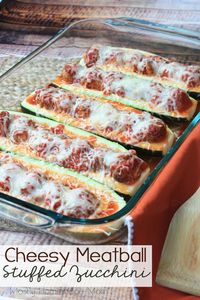 Cheesy Meatball Stuffed Zucchini is super simple and easy for a weeknight meal! Zucchini boats filled with tomato sauce, meatballs, and mozzarella cheese - your family will go nuts for this recipe!