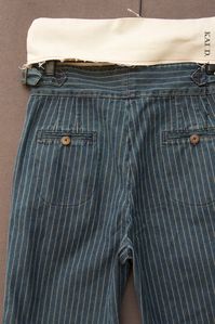 Japanese wabash striped denim washed in medium blue. High waisted pants (based on Isa pants with no pleats and longer inseam). Made in New York. Size S: waist 28" inseam 28" bottom opening 13" Size M: waist 30" inseam 28 1/2" bottom opening 13 1/2" SizeL : waist 32" inseam 28 1/2" bottom opening 14"