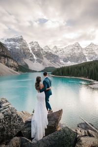 A gorgeous October evening at Moraine Lake in Banff National Park for their wedding photos. Read the blog to find out how they got married in the US but still made Banff National Park a part of their love story!