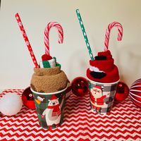 Cupcake Socks in a cup with a straw and candy cane. Great Gifts for Teachers, Friends, Co-Workers, Secret Santa Exchange, Family and makes a great Stocking Stuffers This listing is for one pair of warm Christmas Knee high socks or Christmas booties, wrapped in a Holiday cup with a matching straw and candy cane. One size fits all, Socks/ Booties vary in colors but will be Christmas related varies styles. Need them sooner drop a note! They will be wrapped in a clear cellophane bag with a Holiday T