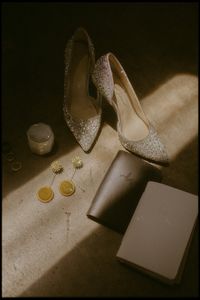 Wedding day flat lay details captured by me. Visit the link below to see more of what I do as a wedding film photographer!