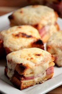 Mini Croque Monsieurs might sounds fancy but they're really just perfectly baked ham and cheese sandwiches with a simple cheesy Bechamel Sauce on top!