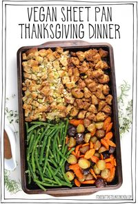 This Vegan Sheet Pan Thanksgiving Dinner is a delectable tribute to the flavors of Thanksgiving, and the best part is that you can enjoy it any day of the week. It's a complete feast including a crispy-on-the-outside, creamy-on-the-inside stuffing, tofu bites that are seasoned to taste like turkey, perfectly roasted potatoes and carrots, and garlicky green beans. It's easy to prepare, and it all bakes together on a sheet pan! #itdoesnttastelikechicken #thanksgiving #vegan