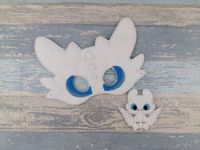 Check out this item in my Etsy shop https://www.etsy.com/uk/listing/682522615/light-fury-dragon-mask-felt-soft-face